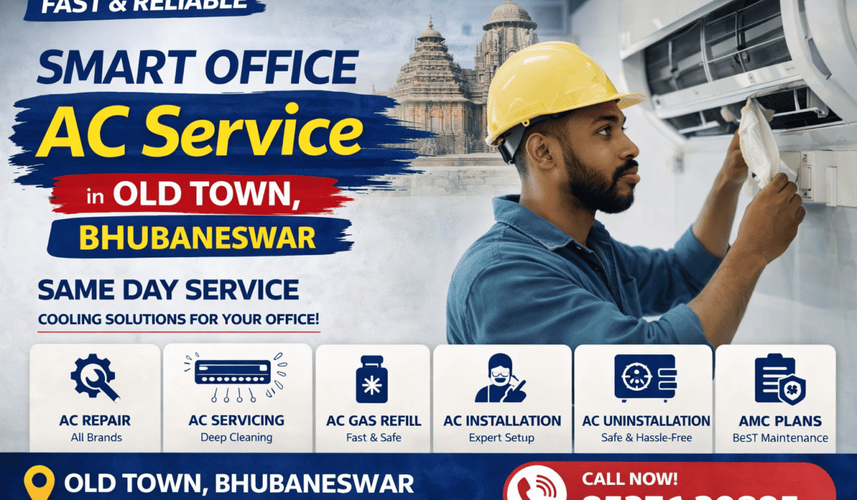 Technician cleaning and servicing wall mounted air conditioner in Old Town Bhubaneswar for office AC repair and maintenance services